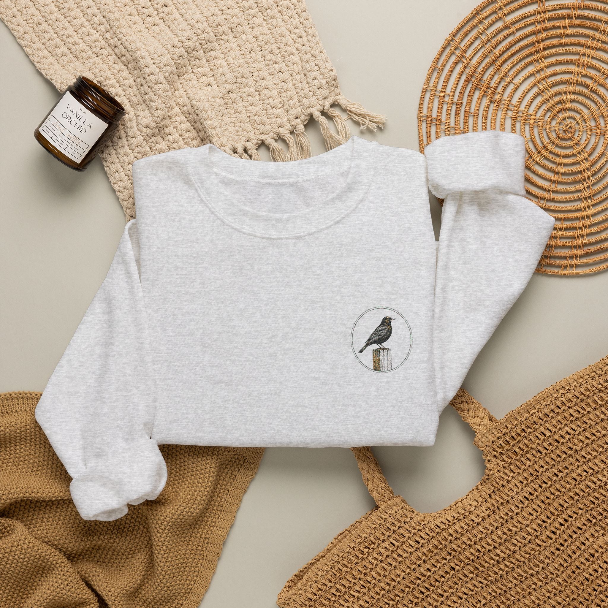 White Crewneck Sweatshirt with Embroidered Patch — Blackbird Graphic