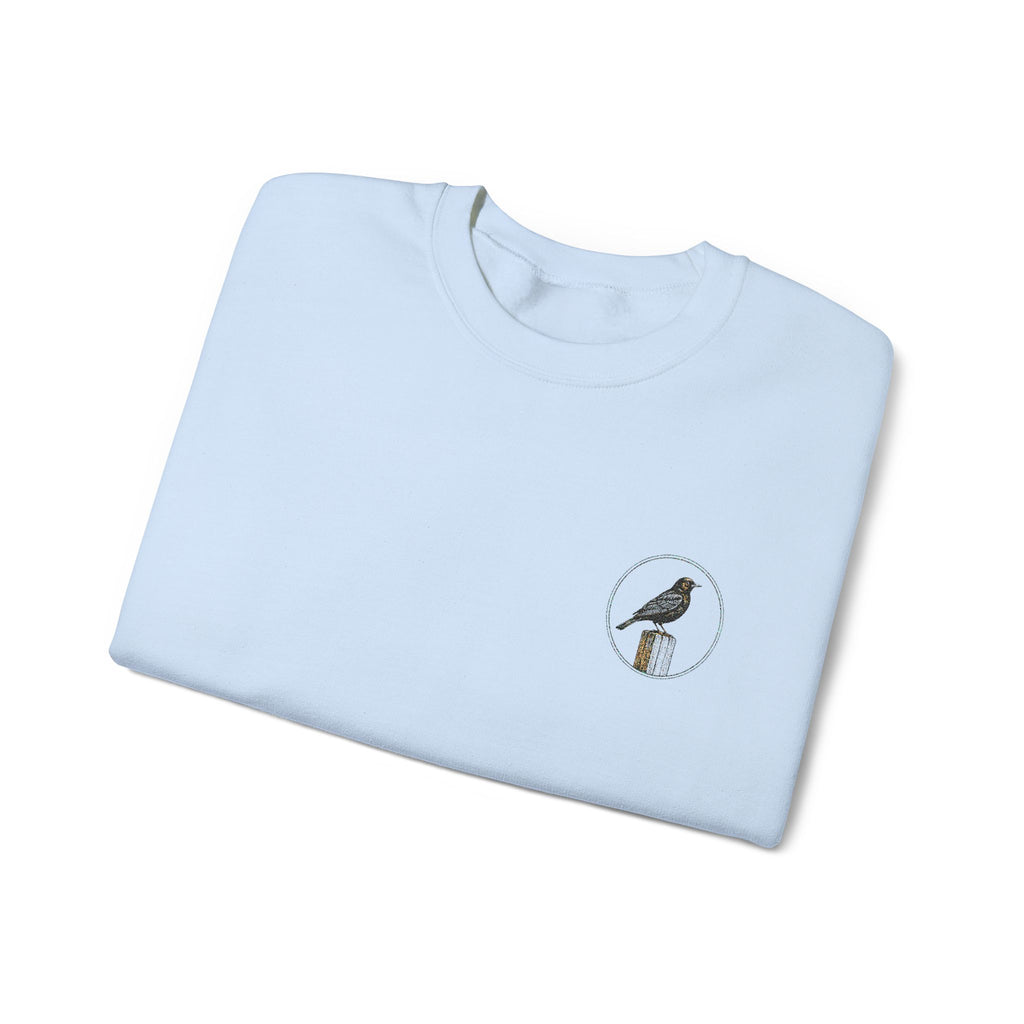 White Crewneck Sweatshirt with Embroidered Patch — Blackbird Graphic