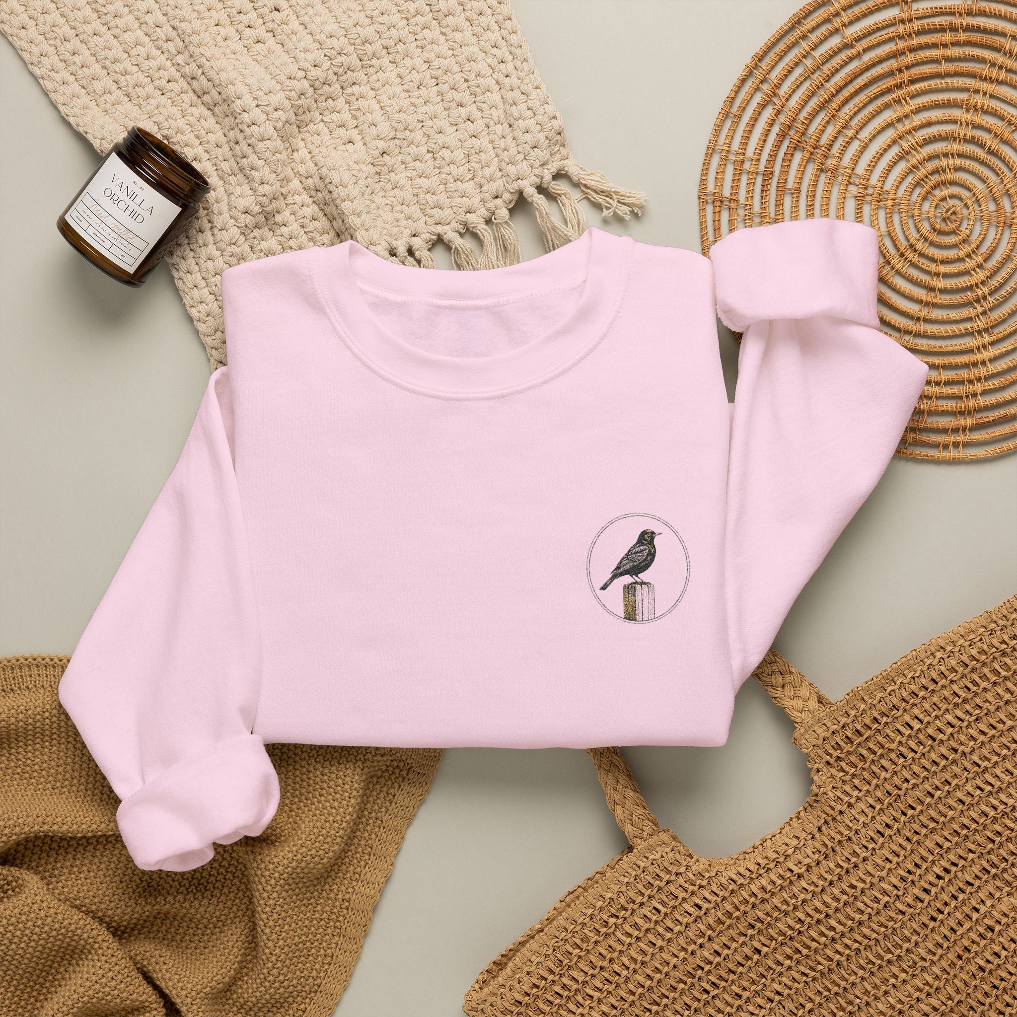 White Crewneck Sweatshirt with Embroidered Patch — Blackbird Graphic