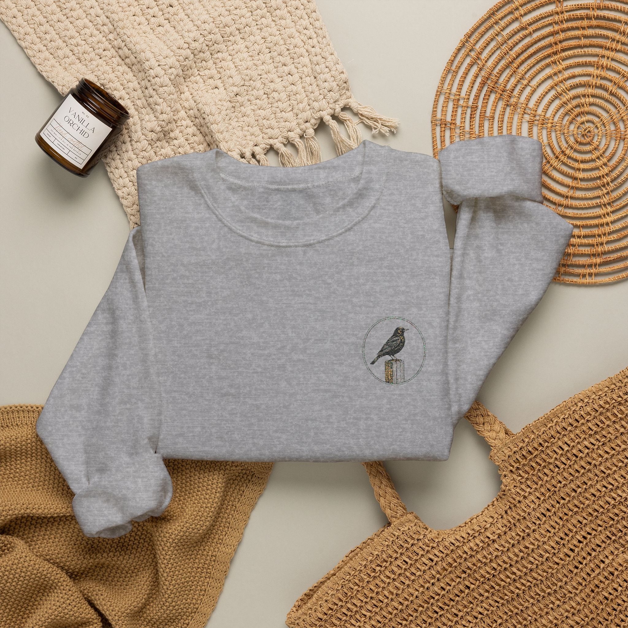 White Crewneck Sweatshirt with Embroidered Patch — Blackbird Graphic