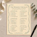 The Wedding Checklist printable styled on a desk